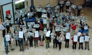 Cambridge residents highlight newspaper recycling in Grand Arcade publicity stunt